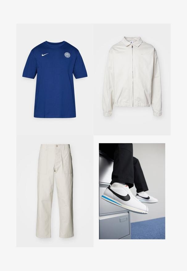 Hvit, lett Nike-jakke med kragehals, glidelås foran, elastiske mansjetter og en liten logo på venstre bryst. Glatt tekstur.; Blå bomulls t-skjorte med kort erm og rund hals, med en hvit Nike-logo på skulderen og et rundt klubbemblem på brystet.; Lyse beige vide bukser laget av bomull. Har frontlommer og knappelukking. Jevn tekstur med subtile vertikale linjer.; Hvite lær sneakers med en svart Nike swoosh, lys blå og grå gummisåle, og klassisk snøring. Føttene hviler på et arkivskap.