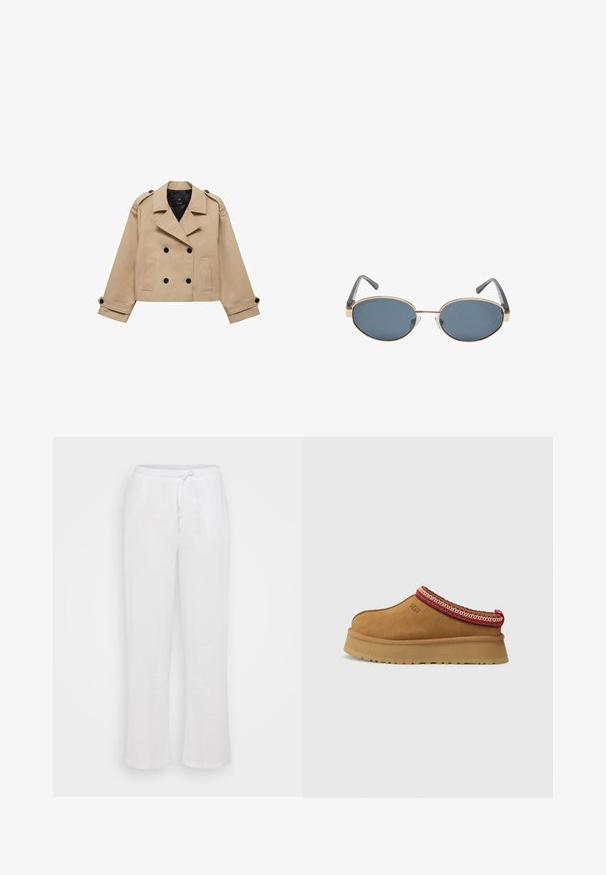 Bežna skrajšana trench jakna z dvostranskim gumbom, epauleti na ramenih in črnimi gumbi. Mehka tkanina in kroj, prilagojen postavi.; Rjav brezrokavnik z kvadratnim izrezom, izdelan iz mehkega materiala. Ima zapiranje s pritisnim gumbom na dnu in prilegajočo silhueto.; Bele bluzne hlače z udobnim krojem, ki vključujejo elastični pas in vrvico. Hlače ravnega kroja brez vzorcev ali dodatnih detajlov.; Rjavi suede natikači z rdečo in smetano obrobo z vzorcem, teksturiranimi podplati in logotipom UGG na strani. Imajo rahlo povišano platformo.; Ovalne sončna očala z temnimi lečami, zlatimi kovinskimi okvirji in sivimi ročaji. Okvirji se ponašajo z minimalističnim dizajnom in subtilnim poudarkom na mostičku.