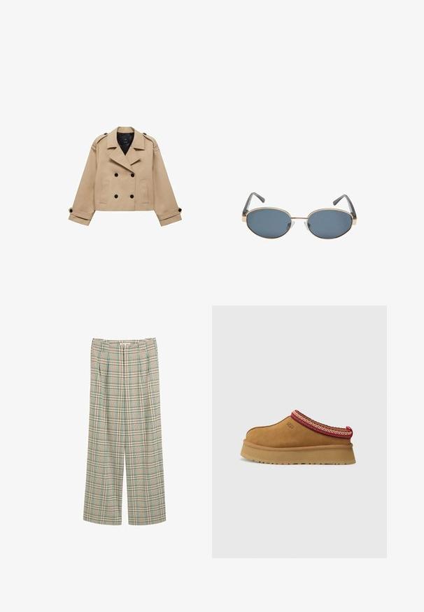Bežani skraćeni kaput s dvostrukim dugmadi, ramennim epauletama i crnim dugmadi. Mekana tkanina i krojeni dizajn.; Bijela majica kratkih rukava od pamuka. Ima okrugli izrez i opušteni kroj. Glatka tekstura bez vidljivih uzoraka ili naglasaka.; Hlače širokih nogavica u bež kariranom uzorku s zelenim i mornarskim plavim naglascima, s prednjim nabora i teksturiranom završnom obradom.; Smeđe zamšaste cipele na sklizanje s crveno-cream uzorkom oko ruba, teksturiranim potplatom i UGG logom sa strane. Imaju blagu platformu.; Ovalne sunčane naočale s tamnim staklima, zlatnim metalnim okvirom i sivim drškama. Okviri imaju minimalistički dizajn s suptilnim naglaskom na mostu.