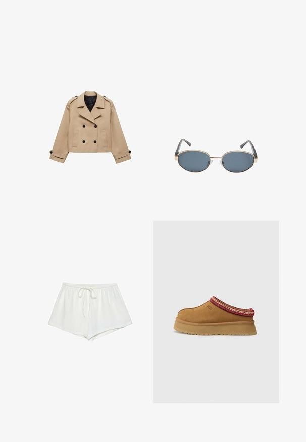 Bežna skrajšana trench jakna z dvostranskim gumbom, epauleti na ramenih in črnimi gumbi. Mehka tkanina in kroj, prilagojen postavi.; Bela kratka majica s kratkimi rokavi iz bombaža. Ima okroglo izrezovanje in sproščen kroj. Gladka tekstura brez vidnih vzorcev ali poudarkov.; Beli bombažni kratki hlače imajo elastičen pas z vrvico, ohlapen kroj in gladko teksturo. Rob je raven, brez dodatnih vzorcev ali okraskov.; Rjavi suede natikači z rdečo in smetano obrobo z vzorcem, teksturiranimi podplati in logotipom UGG na strani. Imajo rahlo povišano platformo.; Ovalne sončna očala z temnimi lečami, zlatimi kovinskimi okvirji in sivimi ročaji. Okvirji se ponašajo z minimalističnim dizajnom in subtilnim poudarkom na mostičku.
