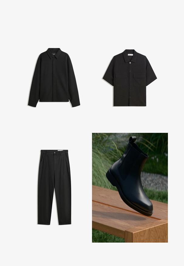 Jachetă neagră cu mâneci lungi și guler ascuțit, cu placket frontal și o textură netedă. Croială lejeră cu umeri lăsați.; Cămașă neagră cu mâneci scurte, realizată dintr-un material cu o textură netedă, dotată cu două buzunare frontale, un guler clasic și închidere cu nasturi.; Pantaloni negri din bumbac cu croială lejeră, având un brâu clasic, plii frontale și buzunare laterale. Textură netedă fără modele.; Bocanci de piele negri, până la glezne, cu un finisaj neted, panouri laterale elastice și un tab de prindere pe șa, așezați pe o suprafață din lemn.