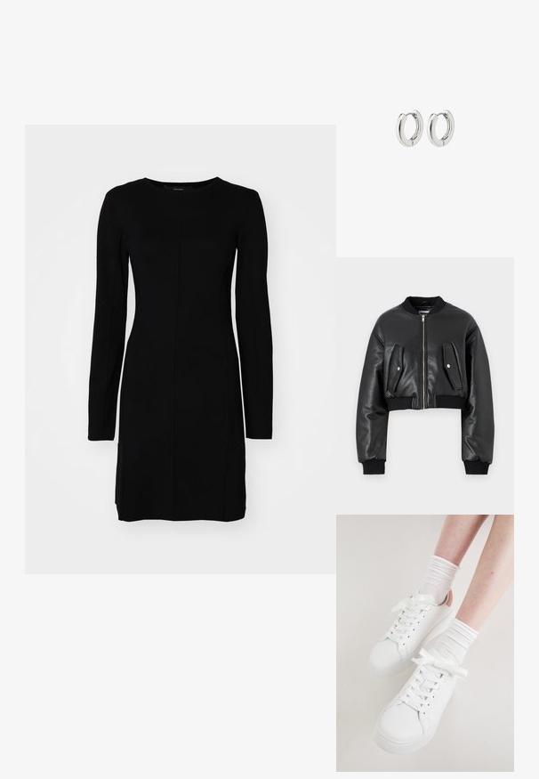 Čierna skrátená bomberská bunda vyrobená z textúrovanej kože s rebrovanými manžetami, s dvomi chlopňovými vreckami a predným zipsom.; Čierne dlhé šaty s dlhým rukávom vyrobené z rebrovanej tkaniny. Pozostávajú z priliehajúcej siluety, okrúhleho výstrihu a centrálneho švu.; Biele kožené tenisky majú zaoblenú špičku, plochú podrážku a hrubé šnúrky. Sú doplnené svetloružovým opätkom a nosené s bielymi rebrovanými ponožkami.; Strieborné kruhové náušnice s lešteným povrchom, s obvodovým dizajnom a bezšvíkovými pántmi, ktoré majú hladkú textúru.