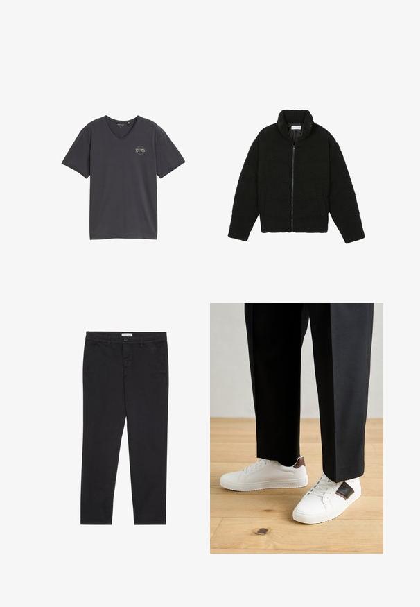 Melnā mākslīgā kažokādas jaka ar augstu apkakli, ar rāvējslēdzēju, elastīgām piedurknēm un kvadrātveida šuvēm. Iespējotas sānu kabatas un mīksta tekstūra.; Pelēks v-veida T-krekls, kas izgatavots no mīkstas auduma. Tam ir īsas piedurknes un apļa logotips ar tekstu kreisajā krūtīs.; Melni kokvilnas bikses ar šauru piegriezumu, kurām ir divas sānu kabatas un priekšējā pogu aizdare. Tekstūrēta auduma ar smalku detalizāciju.; Baltā pārsoļa apavi ar gludu tekstūru, papildināti ar brūniem ādas akcentiem un melniem elementiem, savienoti ar melnām pielāgotām biksēm. Koka grīdas fons.