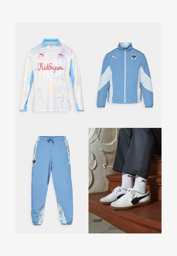 Hellblaues Jackett mit dunklerblauen Akzenten, Reißverschluss, elastischen Bündchen und Logo auf der Brust. Hergestellt aus leichtem, strukturiertem Stoff.; Langärmliges Fußballtrikot in hellen Farben mit Blumenmuster. Verfügt über einen hellblauen Kragen, roten "KidSuper"-Text und ein Logo auf der Brust.; Helle blaue Jogginghose mit elastischem Bund, Seitentaschen und abstrakten Musterelementen an den unteren Seiten. Mit Logo-Details.; Puma-Sneaker aus weißem und schwarzem Wildleder mit einer braunen Gummisohle. Kombiniert mit weißen Socken, die ein schwarzes Logo zeigen, getragen zu dunklen Hosen.
