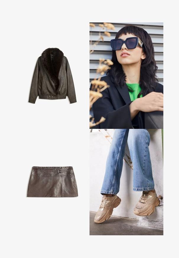 Giacca di pelle marrone con colletto in pelliccia sintetica, vestibilità rilassata, vita a costine e due tasche laterali. Presenta due bottoni frontali per la chiusura.; Camicia bianca corta con colletto a punta, maniche lunghe e texture liscia. Presenta una patta frontale con bottoni abbinati.; Minigonna in pelle marrone con vita decorata da borchie e passanti per cintura con fibbia, texture liscia e design aderente e dritto.; Sneaker beige con accenti metallici, design testurizzato e dettagli in strass, abbinati a jeans dritti di colore blu chiaro.; Occhiali da sole neri oversize con una montatura spessa e dettagli dorati, indossati con un blazer nero e una camicia verde brillante, su uno sfondo orizzontale.