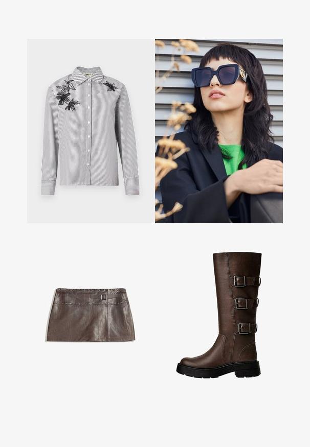 Hnedá kožená bunda s umelým kožuchom na golieri, uvoľnený strih, rebrovaný pás a dve bočné vrecká. Obsahuje dva predné gombíky na zapínanie.; Prúžkovaná čiernobiela košeľa s dlhými rukávmi, s čiernou kvetinovou výšivkou na ľavom ramene a oblasti hrudi.; Hnedá kožená mini sukňa s ozdobným pásom na trakoch a pútkom na opasok s prackou, hladká textúra a elegantný, rovný strih.; Hnedé kožené čižmy po kolená s tromi kovovými prackami, textúrovaný povrch, okrúhla špička a hrubá podrážka pre stabilitu.; Prehnané čierne slnečné okuliare s hrubým rámom a zlatým akcentom, nosené s čiernym sakom a jasne zelenou košeľou, na horizontálnom pozadí.