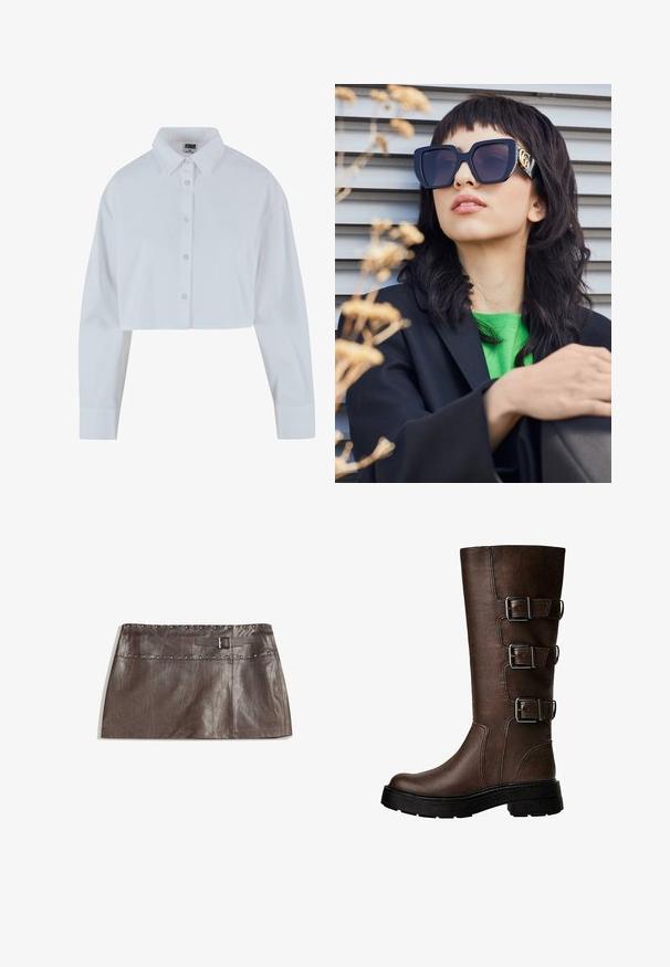 Brun læderjakke med krave i kunstpels, afslappet pasform, ribbet talje og to sidelommer. Har to frontknapper til lukning.; Afskåret hvid skjorte med spidse kraver, lange ærmer og en glat tekstur. Har en frontplacket med matchende knapper.; Brun læder mini nederdel med en nittet talje og en bælteløjfe med spænde, glat tekstur og slankt, lige design.; Brune læderknæstøvler med tre metalliske spænder, struktureret overflade, rund tå og chunky sål for stabilitet.; Overdimensionerede sorte solbriller med en tyk ramme og guld accenter, båret med en sort blazer og en lys grøn skjorte, mod en horisontal baggrund.