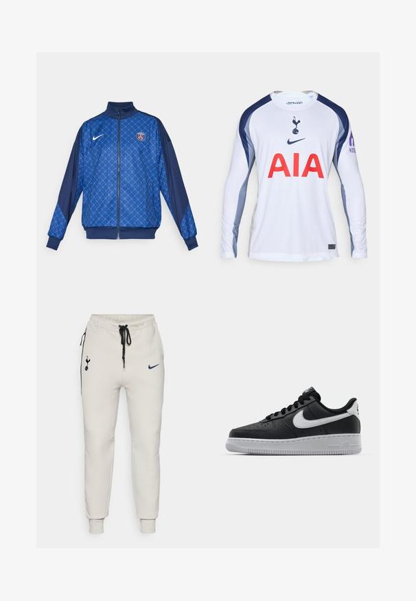 Jacket albastru cu fermoar, decorat cu un model geometric, având un guler înalt și manșete elastice. Logo-ul Nike pe față, împreună cu un distintiv tematic Paris.; Tricou de fotbal alb cu mânecă lungă, cu accente albastre închis, având logo-ul Tottenham Hotspur și "AIA" în roșu pe față.; Pantaloni Nike de training gri deschis cu accente negre. Prezintă logo-uri brodate, talie elastică cu șnur și manșete la glezne.; Sneaker din piele neagră, cu o suprafață texturată, swoosh alb de la Nike, talpă gri, bot rotund și sistem de șireturi. Prezintă perforații în zona vârfului.
