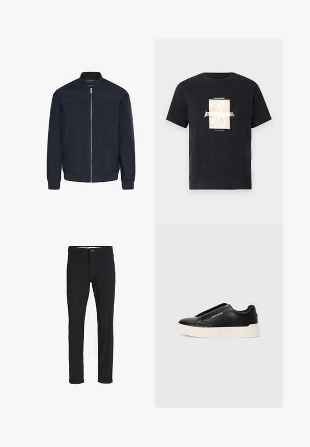 Giacca bomber militare in tessuto liscio, caratterizzata da una cerniera frontale, polsini a coste e due tasche laterali con un dettaglio di marchio discreto.; Maglietta in cotone nera con collo tondo. Presenta una grafica rettangolare beige e il testo bianco, "JAWO," centrato sulla parte frontale. Maniche corte.; Pantaloni neri in cotone misto con vestibilità slim, dotati di chiusura con bottone, tasche e orli arrotolati per un look informale.; Sneaker nera slip-on con parte superiore in pelle texturizzata, suola in gomma bianca e senza lacci visibili. Presenta il logo del marchio sul lato.