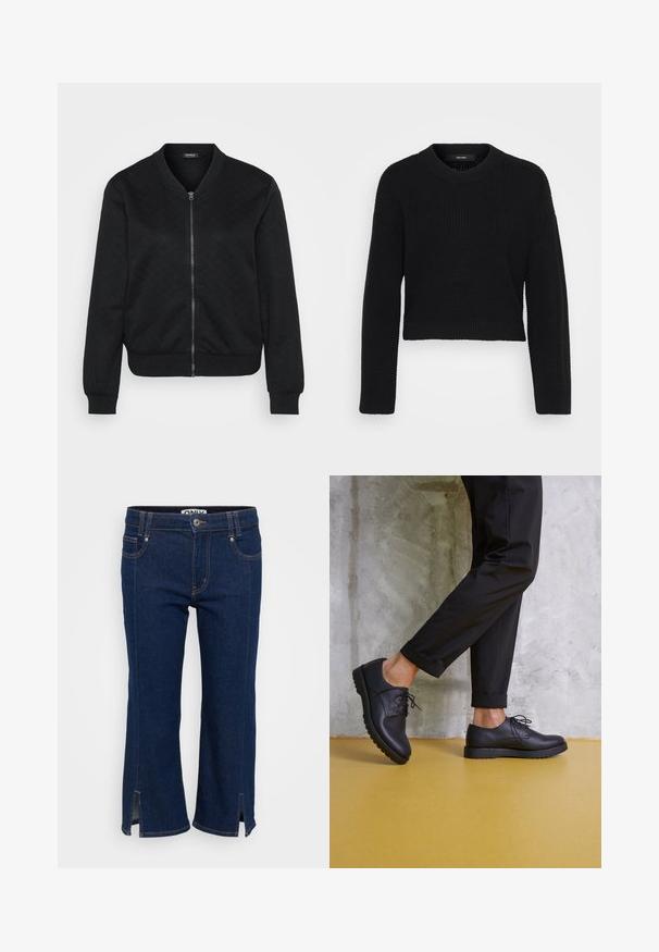 Casaco bomber preto com um padrão texturizado acolchoado, fecho zip, punhos e bainha às riscas, e um decote arredondado.; Sweater preto cortado feito de tecido de malha. Apresenta um decote redondo, mangas longas e uma superfície texturizada com um ajuste justo na bainha.; Calças jeans cropped em denim azul escuro com fendas laterais na bainha, costuras laranjas contrastantes e fecho de botão na cintura.; Sapatos pretos de couro com atacadores, bico arredondado e sola de borracha texturizada. Usados com calças pretas curtas, contra um fundo de cimento.