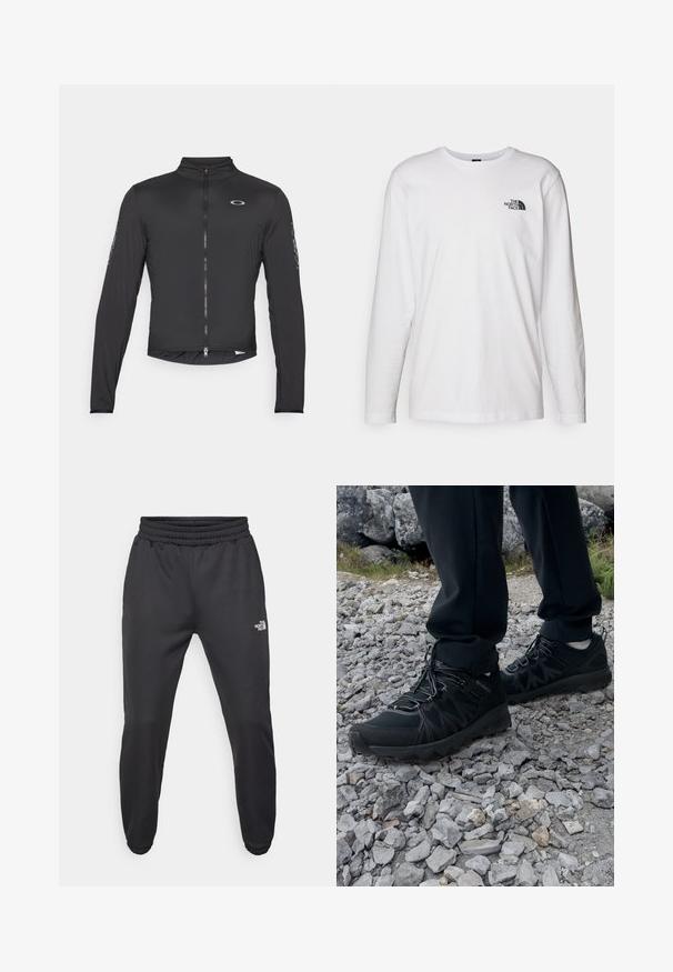 Sort cykeljakke med lange ærmer, høj krave, fuld frontlynlås og elastiske manchetter. Har logo på brystet og trykte detaljer på ærmerne.; Hvid langærmet T-shirt lavet af bomuld med rund hals. Har et lille sort logo på brystet. Glat tekstur, almindelig pasform.; Sorte sweatpants med snor i livet, tætsiddende pasform, elastiske manchetter og et lille hvidt logo på venstre lår, lavet af glat stof.; Sorte udendørssko med mesh og syntetisk materiale, med en tekstureret overdel, sikre snørebånd og en robust ydersål, på klippelandskab.