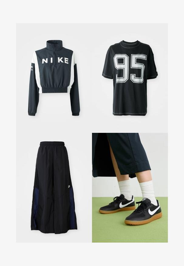 Nike cropped jakke med høy krage, mørk marineblå kropp, hvite ermer, elastisk kant, stort logo på fronten, og små tekstdetaljer på ermer.; Svart bomull T-skjorte med korte ermer, med hvit trykket nummer "95" foran og kontrasterende søm langs kantene.; Svarte vide bukser laget av lett stoff, med et marineblått sidestykke og elastisk midjebånd. Liten hvit logo nederst.; Sorte lær- og syntetiske joggesko med hvit Nike swoosh, gummisåle, rund tå og sorte lisser. Ribbet hvite sokker synlige.