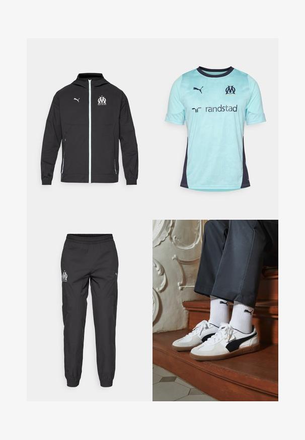 Schwarze, leichte Jacke mit Kapuze, ausgestattet mit einem Frontreißverschluss, weißem Puma-Logo und einem Marseille-Design auf der Brust, elastischen Bündchen und seitlichen Taschen.; Helles blaues Fußballtrikot mit kurzen Ärmeln und dunklen Marine-Akzenten, das ein strukturiertes Muster aufweist, einen Rundhalsausschnitt hat und Logos auf der Brust und den Ärmeln trägt.; Schwarze Sporthose aus leichtem Stoff. Sie verfügt über einen elastischen Bund, Seitentaschen und graue Logos auf beiden Seiten.; Puma-Sneaker aus weißem und schwarzem Wildleder mit einer braunen Gummisohle. Kombiniert mit weißen Socken, die ein schwarzes Logo zeigen, getragen zu dunklen Hosen.