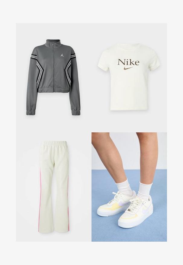 Grijze, korte trainingsjack van gladde stof met een hoge kraag, ritssluiting aan de voorkant en zwart-witte strepen op de mouwen. Heeft een logo op de borst.; Wit cropped t-shirt met korte mouwen, voorzien van bruine "Nike" tekst en een luipaardprint Nike swoosh logo op de borst.; Lichtbeige broek met een elastische tailleband, voorzien van roze zijpanelen en zijzakken. Gladde textuur met een recht gesneden pasvorm.; Witte leren sneakers met gele en lavendelkleurige accenten, ronde neus, platte veters en een textuurrubber zool. Gdraag met witte sokken.