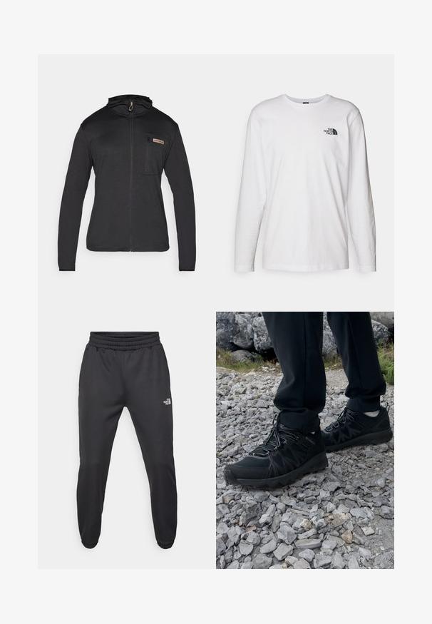 Czarna, długoskrzydła kurtka zapinana na zamek z kapturem, z przednią kieszenią i teksturowanym materiałem. Minimalistyczny design z tonową nicią.; Biała koszulka z długim rękawem wykonana z bawełny, z okrągłym dekoltem. Posiada małe czarne logo na piersi. Gładka faktura, regularny krój.; Czarne dresy z elastycznym paskiem w talii, zwężanym krojem, elastycznymi mankietami i małym białym logo na lewej udzie, wykonane z gładkiego materiału.; Czarne buty outdoorowe wykonane z siateczki i materiału syntetycznego, z fakturowaną cholewką, zabezpieczonym systemem sznurowania i solidną podeszwą, na skalistym terenie.