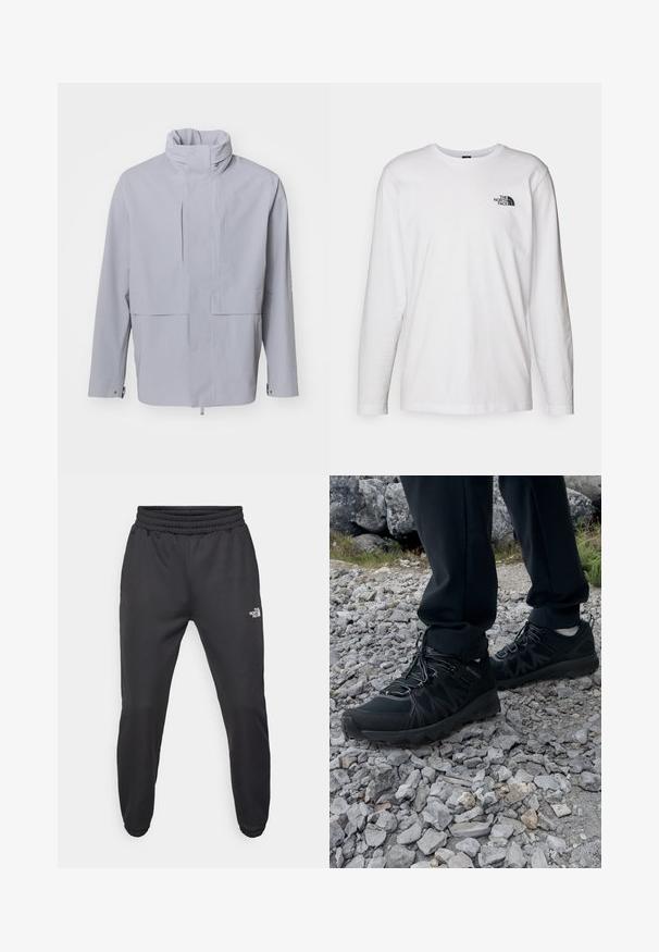 Jasnoszara kurtka z wysokim kołnierzem, zapięciem na guziki i skróconym krojem. Posiada gładką teksturę, minimalistyczny styl i brak widocznych wzorów.; Biała koszulka z długim rękawem wykonana z bawełny, z okrągłym dekoltem. Posiada małe czarne logo na piersi. Gładka faktura, regularny krój.; Czarne dresy z elastycznym paskiem w talii, zwężanym krojem, elastycznymi mankietami i małym białym logo na lewej udzie, wykonane z gładkiego materiału.; Czarne buty outdoorowe wykonane z siateczki i materiału syntetycznego, z fakturowaną cholewką, zabezpieczonym systemem sznurowania i solidną podeszwą, na skalistym terenie.