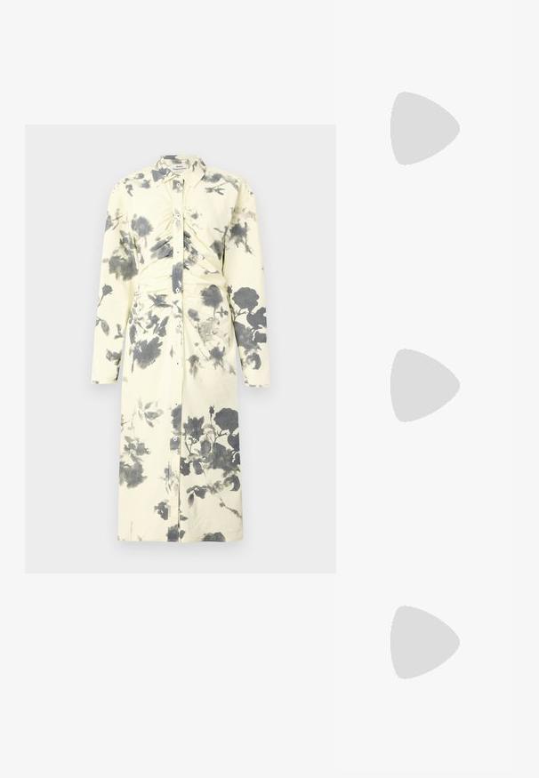 Long-sleeve, button-up dress in soft yellow fabric featuring a black floral print and gathered detailing at the waist.; Black high-heeled sandals feature thin straps with a knotted design, a smooth square toe, and a sleek stiletto heel.; Light gray metallic handbag featuring a chain strap, embellished with small circular metallic studs and a triangular brand logo.; Silver hoop earrings with a smooth, shiny finish. Rounded shape, lightweight design, featuring a post-back closure.