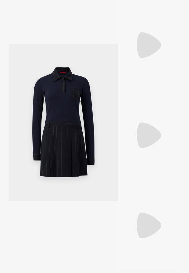 Robe polo marine à manches longues, texture côtelée, fermeture à boutons et poche sur la poitrine ; la jupe présente des rayures verticales et des plis.; Bottine en cuir marron avec un orteil carré, une finition texturée et un petit talon empilé. Présente une languette à l'arrière et des détails de couture subtils.; Sac en cuir embossé crocodile marron avec une forme cylindrique, quincaillerie dorée et une bandoulière détachable ornée de clous.; Rabanne XL LINK  DOUBLE HOOP EARRINGS - Boucles d'oreilles - gold-coloured