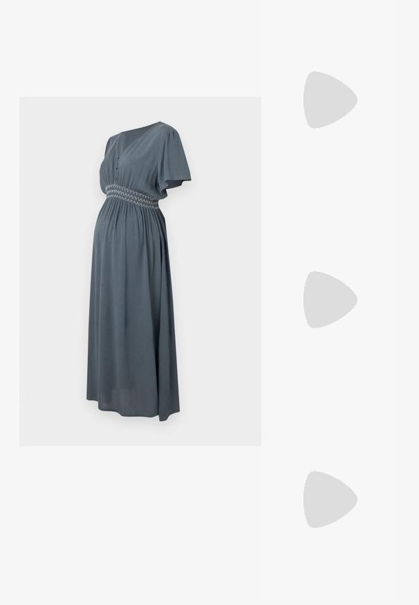 Gray maternity dress with short sleeves, V-neck, and a smocked waistband detail for a flowing silhouette and soft texture.; Black patent leather slingback heels with a pointed toe, a rounded cutout design, and a block heel. Features a gold-tone buckle accent.; Black oversized sunglasses with gradient lenses, thick frames, and gold-tone chain detailing on the temple arms.; Black handbag with structured shape, smooth texture, and a metallic clasp. Paired with wide black pants and open-toe sandals on wooden floor.