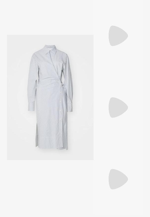 Long-sleeve, wrap dress in white fabric with a blue geometric grid pattern. Features a button closure, collared neckline, and side slit.; Black leather knee-high boots with chunky soles, featuring smooth texture and minimal stitching, paired with a houndstooth-patterned skirt.; AESTHER EKME OPAL BAG - Handbag - black; Silver pearl earrings with a curved, bean shape. Smooth, shiny surface and secured with a post and back closure.