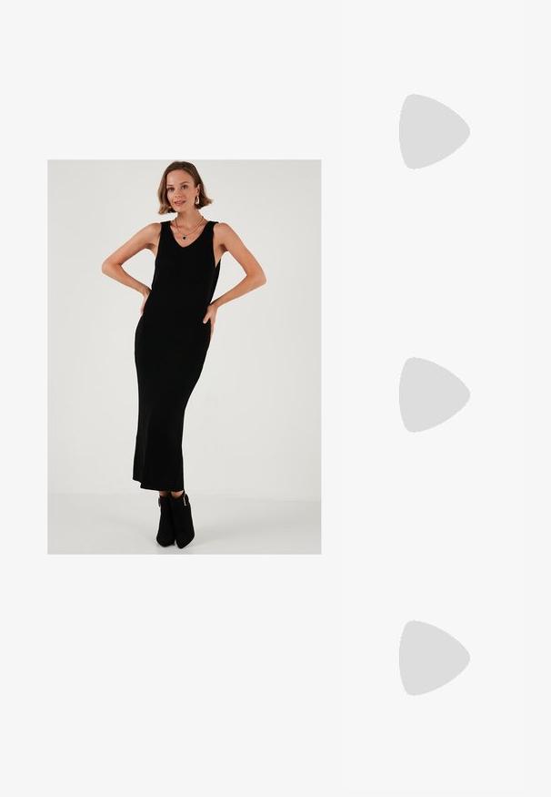 Black ribbed maxi dress with a V-neck, sleeveless design, and subtle flare at the hem. Paired with black ankle boots, featuring metallic accents.; Black patent slingback heel with a pointed toe, featuring textured snake print, adjustable strap, and a short, textured block heel.; Black leather crossbody bag with two front pockets, gold buckles, zipper closure, and a slim strap. Textured surface and compact rectangular shape.; Gold-tone metal hoop earrings with a curved, elongated shape. Features a smooth, shiny surface and a rounded tip for added detail.