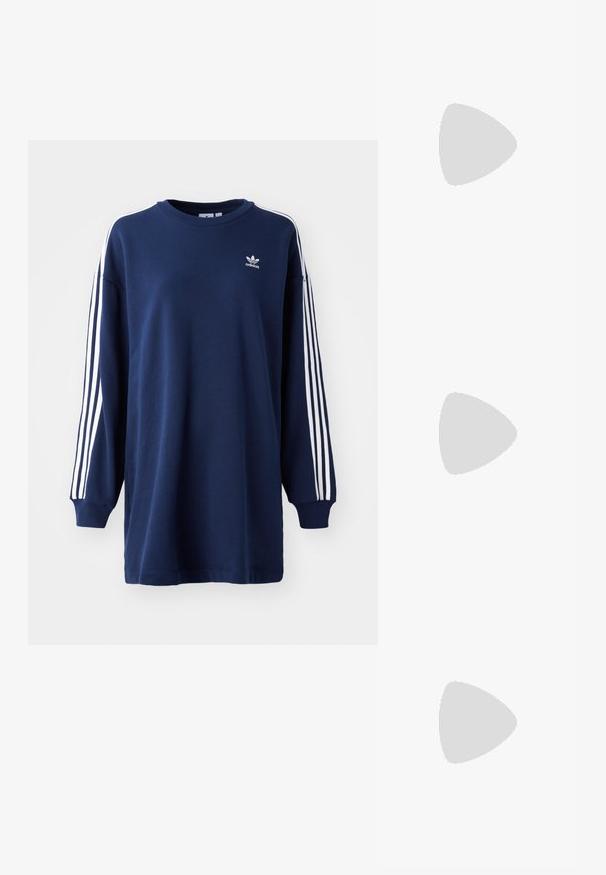 Mörkblå sweatshirt i bomull. Har en vit tre-stripes design längs ärmarna och en liten logotyp på bröstet. Rund halsringning.; Svart läder snörboot med tjock sula med mönster och gul söm, upphängd mot en gul cirkulär bakgrund.; Solglasögon med en stilren, silverfärgad plastbåge, mörkt tonade linser och böjd form. Har djärva accenter och en lättviktsdesign.; Silverfärgade hoopörhängen med en slät, polerad yta. Rund form och säker klickstängning. Lättviktig design som passar för vardagligt bruk.