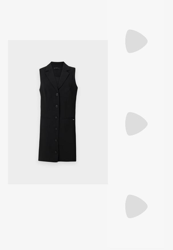 Black sleeveless blazer dress with a tailored design, notched lapels, six front buttons, and side pockets. Smooth fabric with minimal accents.; Black high-heeled sandals feature thin straps with a knotted design, a smooth square toe, and a sleek stiletto heel.; Light gray metallic handbag featuring a chain strap, embellished with small circular metallic studs and a triangular brand logo.; Silver hoop earrings with a smooth, shiny finish. Rounded shape, lightweight design, featuring a post-back closure.