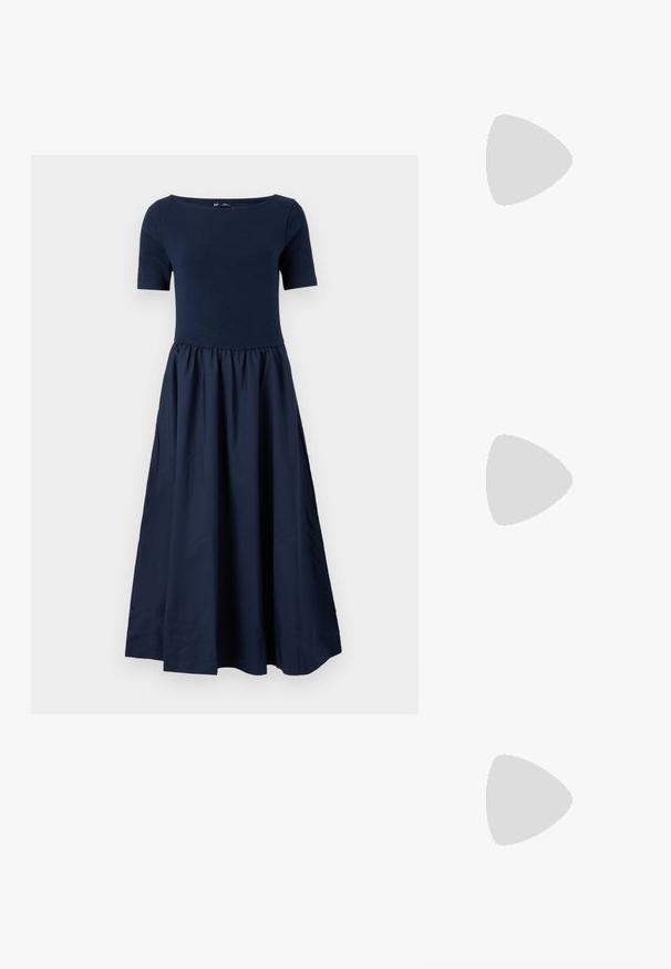 GAP DRESS - Maxi ruha - navy uniform; Fehér pamut póló, amelyen elöl egy nagy, élénkpiros homár grafika látható. Rövid ujjú és standard környakú kialakítás.; Fehér magaskorsó vászon sportcipő fekete gumi talppal, elülső gumi orrnyereggel és hat fűzőlyukkal, letisztult, minimalista dizájnnal.; Piros bőr kézitáska szögletes, geometrikus kialakítással. Egy állítható pánttal és varrott részletekkel ellátott fedélzárral rendelkezik.
