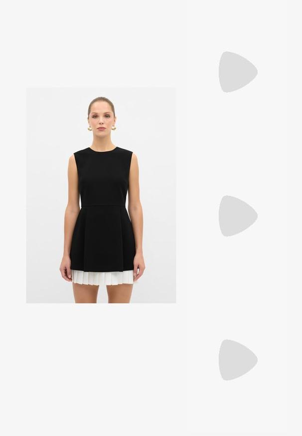 Robe noire sans manches avec un corsage ajusté et une jupe plissée blanche, dotée d'un col rond et d'une texture lisse.; Chaussure à talon haut noire à bout pointu avec un talon fin, un dos ouvert et une bride au niveau de la cheville. Fabriquée en matériau lisse avec un design épuré.; Sac à main matelassé noir avec une bandoulière en chaîne dorée, présentant un fermoir doré distinctif et une petite étiquette, mettant en valeur une surface en cuir texturé.; Montre carrée en argent et or avec un cadran blanc, marqueurs horaires dorés, et un bracelet en métal tressé avec des maillons argentés et dorés alternés.