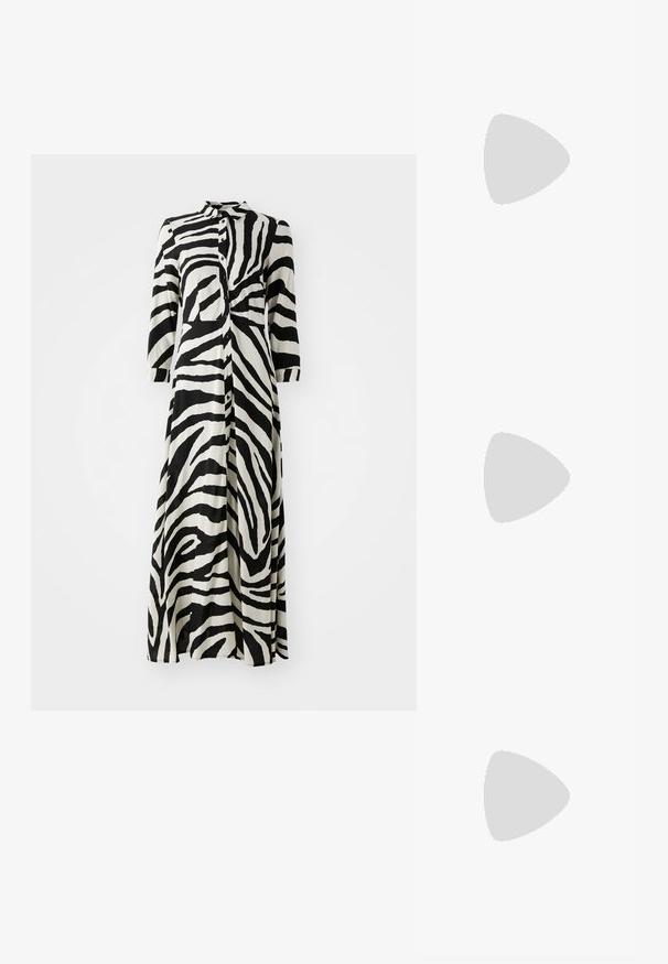 Langes Hemdblusenkleid in Schwarz-Weiß-Zebrastreifen-Muster, mit 3/4-Ärmeln, einem Kragen und geradem Schnitt. Hergestellt aus leichtem Stoff.; Schwarze Lackleder-Slingback-High Heels mit spitzem Schuh und einem geometrischen Blockabsatz. Verfügt über ein schlankes, minimalistisches Design und eine glatte Textur.; Schwarze Lederhandtasche mit geschwungener Form, abnehmbarem Tragegurt und goldenen Beschlägen. Die Tasche verfügt über einen Deckel mit einer Schnallen-Details.; Goldfarbener Ring mit einem organischen, gedrehten Design, glatter Oberfläche und sich verjüngenden Enden, was ein modernes, skulpturales Erscheinungsbild erzeugt.