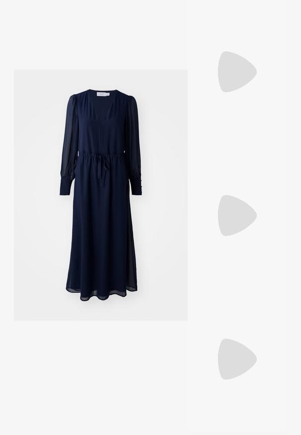 Navy blue dress with a V-neck, long sheer sleeves, and a cinched waist. Features a tie belt and side slits for ease of movement.; Pointed-toe high heel shoe with a silver, gold, and nude color scheme. Glossy finish with cutout design, featuring a stiletto heel.; Silver metallic pouch bag with a soft, rounded shape and a knotted top closure. Made from smooth faux leather material.; Silver hoop earrings with a twisted design, featuring a polished finish and post-back closure. Measure approximately 3 cm in diameter.