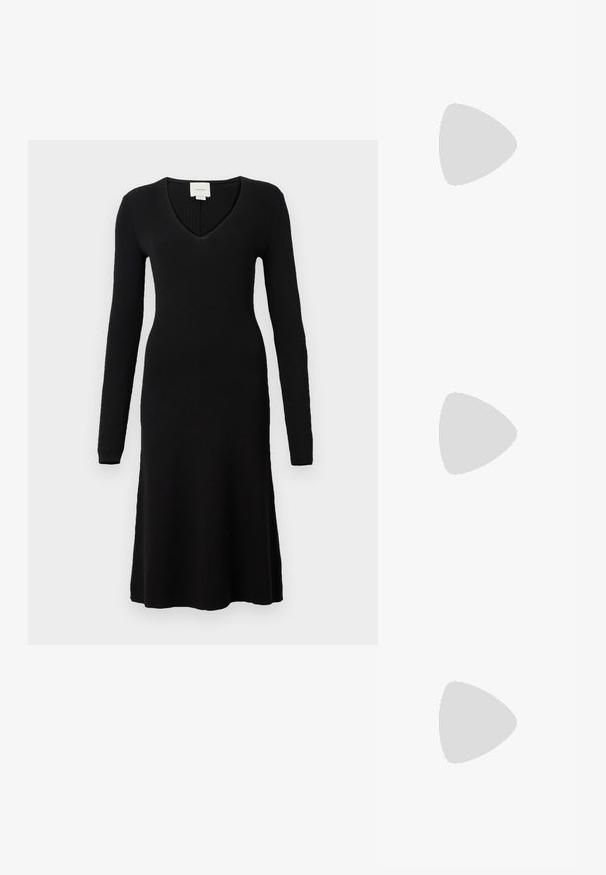 Black ribbed knit dress with long sleeves and a deep V-neck. A-line shape with a flared hem, made from a soft, textured fabric.; Black high-heeled sandals feature thin straps with a knotted design, a smooth square toe, and a sleek stiletto heel.; Light gray metallic handbag featuring a chain strap, embellished with small circular metallic studs and a triangular brand logo.; Silver hoop earrings with a smooth, shiny finish. Rounded shape, lightweight design, featuring a post-back closure.
