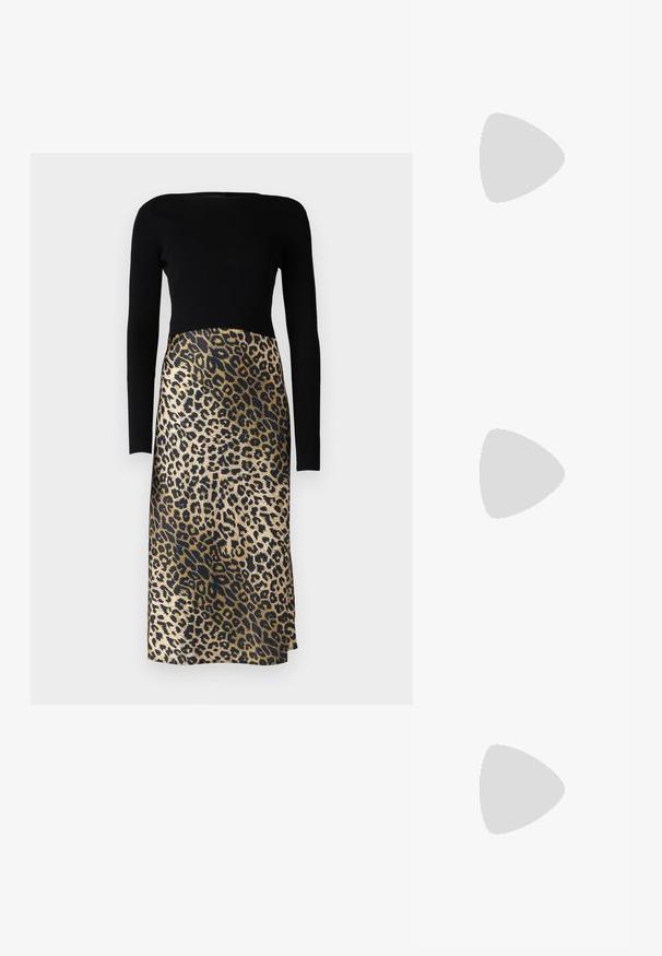 Long-sleeved dress featuring a ribbed black top and a leopard print skirt in shades of gold and black, with a smooth texture.; White leather sneakers with a thick white sole, black suede heel accent, and embossed logo on the side. Laced design with six eyelets.; Black oversized sunglasses with a geometric shape, featuring dark lenses and a contrasting grey detail on the frame. Logo on the arm.; Silver hoop earrings with a smooth, shiny finish. Rounded shape, lightweight design, featuring a post-back closure.