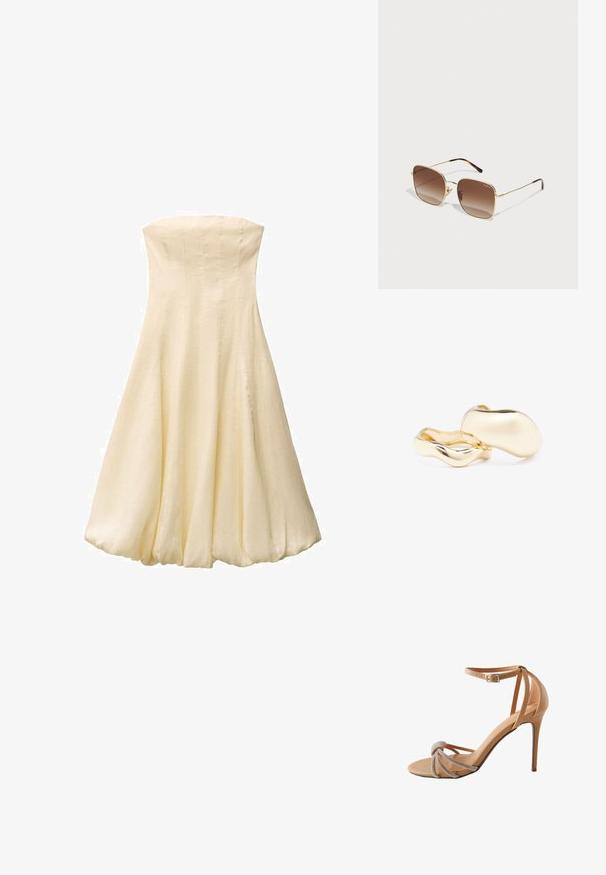 Krema boje bez naramenica sa uskim korzetom i lepršavom suknjom. Napravljena od glatkog, laganog materijala, sa vertikalnim šavovima.; Cipele s potpeticom u boji kože, s čvorastim prednjim dijelom ukrašenim rhinestones detaljima i tankim remenom oko gležnja s kvadratnom kopčom.; Zlatne metalne sunčane naočale sa četvrtastim okvirom, smešnim gradijentnim staklima i šarama kornjačevine na drškama. Lagani dizajn.; Zlatne naušnice organskog, zrnastog oblika s glatkom, reflektirajućom površinom; imaju minimalistički dizajn bez vidljivih dijelova.