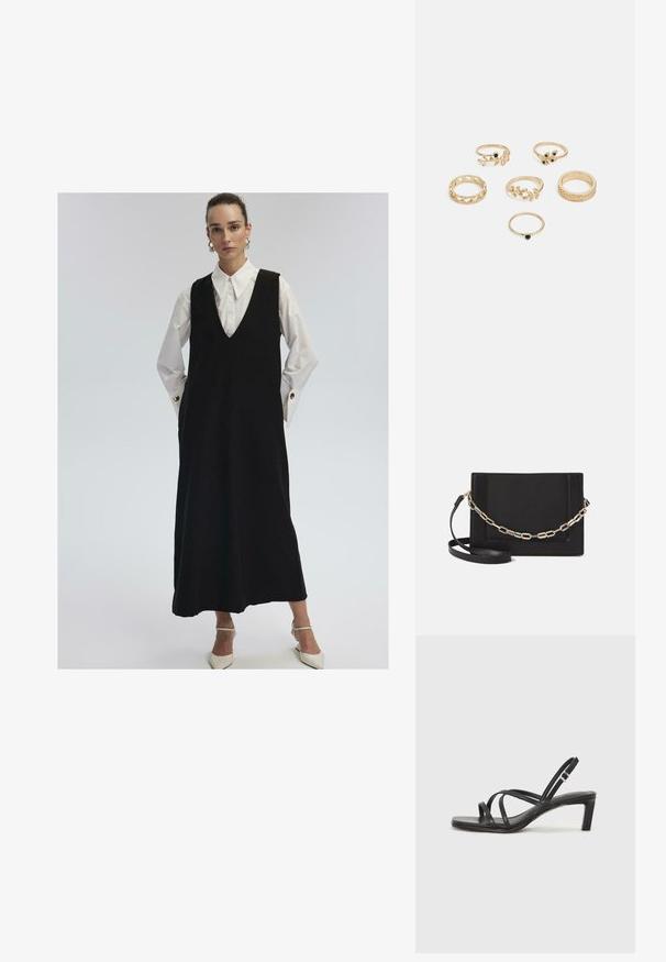 Frau in einem langen schwarzen ärmellosen Kleid über einem weißen Hemd mit großen Manschetten und goldenen Knöpfen, kombiniert mit weißen spitzen Absätzen.; Schwarze Sandale mit Riemchen, quadratischer Zehenform und niedrigem Blockabsatz. Verfügt über mehrere dünne Riemen und einen verstellbaren Knöchelriemen. Hergestellt aus glattem Leder.; Schwarze Leder-Crossbody-Tasche mit glatter Textur, rechteckiger Form und metallic-kettendetail auf der Vorderseite. Verstellbarer Gurt inklusive.; Set aus sechs goldenen Ringen mit verschiedenen Designs: geflochten, mit Blattmotiven und soliden Bändern; einige mit grünen Edelsteinen akzentuiert.