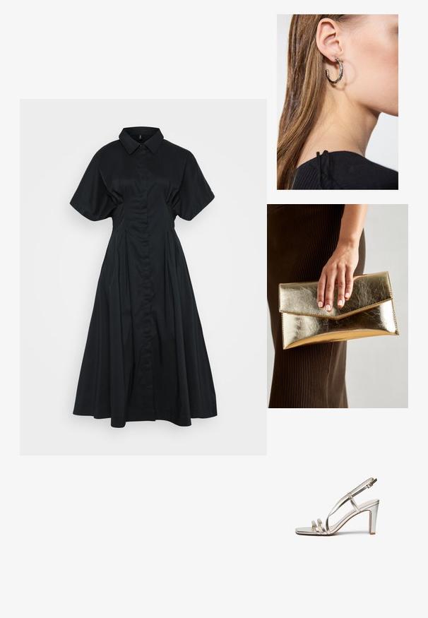 Melns krekliņs ar īsām, platām piedurknēm, pogu aizdari un pilnu, krokotu svārku. Izgatavots no gludas, vieglas auduma.; Metāliski sudraba augstpapēžu sandaļi ar atvērtu purngalu, kas aprīkoti ar trim plāniem siksniņām pāri pēdai un potītes siksniņu ar sprādzi.; Zelta metalizēta sajūga soma ar gludu tekstūru, kuru rotā trīsstūrveida vāks. Rokai, kas to tur, ir kārtīgi apgriezti nagi.; Sudraba auskars ar pulētu apdari, ar maziem zelta akcentiem un apaļu formu, uz ausu ļipiņas.