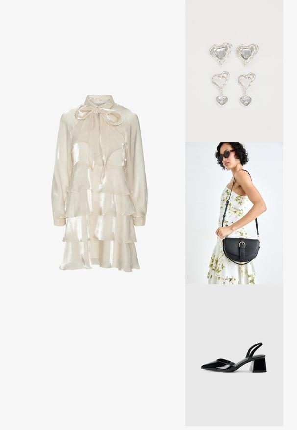 Vestido longo de cetim creme com mangas compridas, camadas de babados e um grande laço atado na gola.; Sandy em verniz preto com salto slingback, ponta afilada e salto geométrico. Apresenta um design elegante e minimalista com textura suave.; Bolsa de couro preta com forma curva, alça destacável e detalhes em dourado. A bolsa possui uma aba com detalhe de fivela.; Os brincos em forma de coração prateados apresentam pedras claras facetadas, com uma moldura texturizada. O conjunto inclui estilos de botão e de gota.