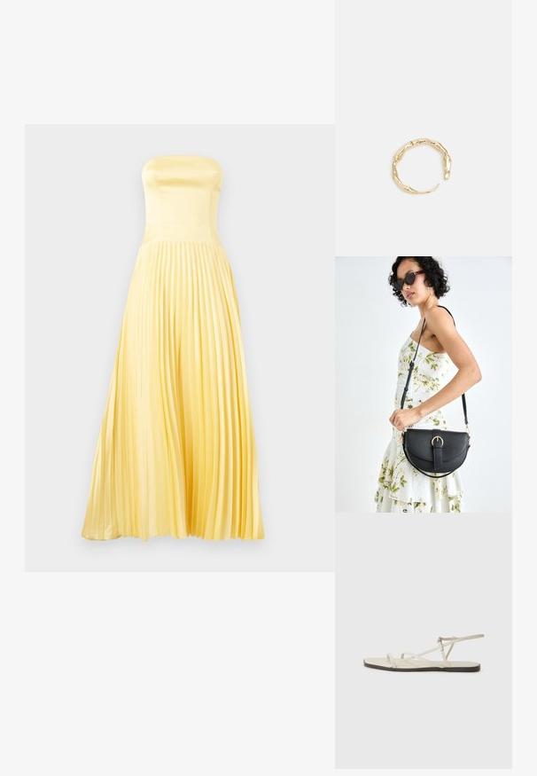 Maxi šaty bez ramienok v svetložltom saténe. Majú priliehavé korzetové telo a skladanú sukňu. Hladká textúra s plynulým siluetou.; Béžové ploché sandále s viacerými štíhlymi popruhmi a nastaviteľnou prackou. Podrážka je plochá s jemným tmavým kontrastom na okraji.; Čierna kožená kabelka s zaobleným tvarom, odnímateľným popruhom a zlatými doplnkami. Kabelka má klopu s detailom s prackou.; Prsteň v zlatej farbe s organickým, skrúteným dizajnom, hladkým povrchom a zužujúcimi sa koncami, vytvárajúci moderný, sochársky vzhľad.