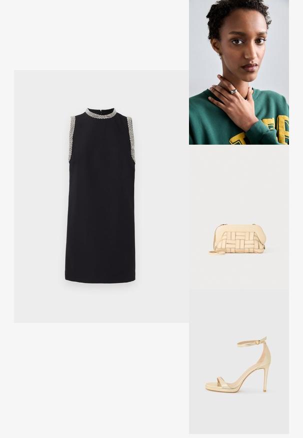Juodas suknelė be rankovių su aukštu apykakle, papuošta akmenukais ant pečių. Lygi medžiaga su tiesia silueto linija.; Auksinės metalinės aukštakulnės basutės su atvira nosimi, kulkšniai skirtu diržu su sagtimi ir platforma, suteikiančia papildomo aukščio. Lygi tekstūra.; Austintais bežinis rankinukas su struktūrizuotu dizainu, turintis lygią viršutinę dalį ir ilgas diržas. Tekstūruoti elementai pagerina bendrą išvaizdą.; Sidabro žiedas su lygiu, lenktu dizainu, papuoštas žvaigždutės akcentu. Modelis vilki žalią megztinį su geltonais užrašais, rankos priglaustos prie kaklo.