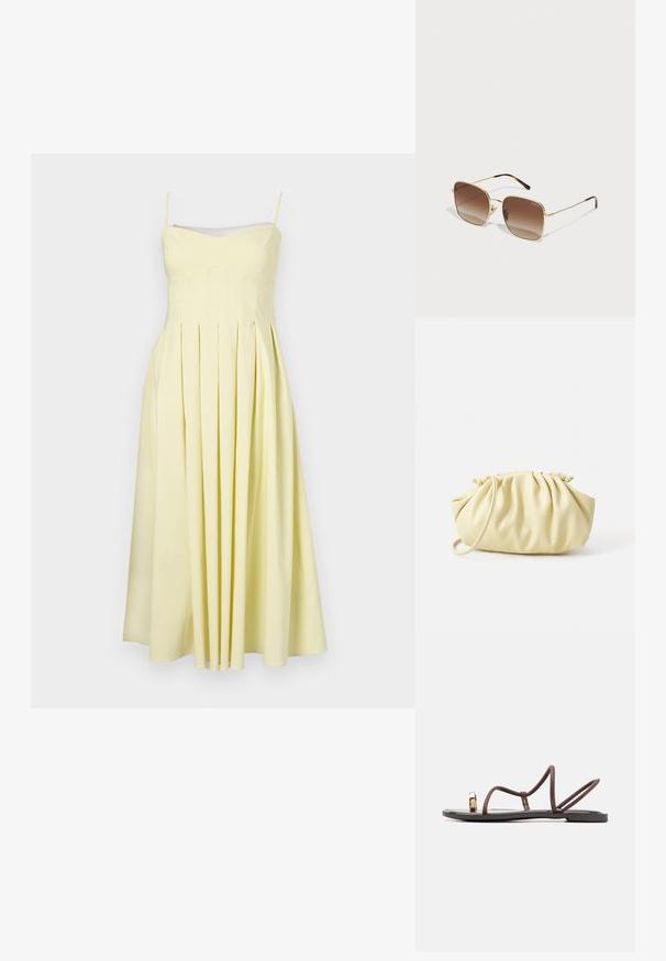 Kollane plekitud kleit reguleeritavate õlapaeltega ja sobiva rindade piirkonnaga, millel on sile tekstuur ja voolav seelikuosa, mis ulatub keskmise sääreni.; Pruunid lamedad sandaalid mitme peene rihmaga, varvassilmusega ja kuldse aktsendiga. Üksik tallaoplasm on lame ja sellel on sile pind.; Kuldne metallist prillid neljakanda raami, pruuni gradueeritud objektiivide ja kilpkonnakilbi detailidega kätel. Kerge disain.; Kollane voltitud käekott, mis on valmistatud siledast kunstnahast, omab pehmet kuju ühe õlarihmaga ja volditud ülaosaga disaini.