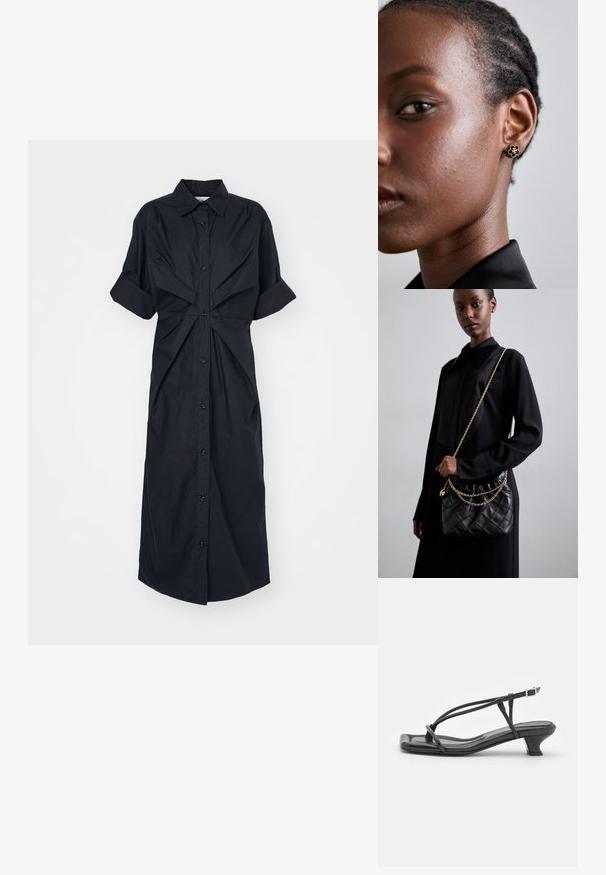 Zwarte shirtjurk met korte opgerolde mouwen, knopen aan de voorkant en gedraaid stofdetail bij de taille, gemaakt van lichtgewicht stof.; Zwarte leren sandaal met dunne banden, lage blokhak en vierkante neus. Heeft een gespsluiting en een zachte textuur.; Zwarte gewatteerde leren handtas met een gathered bovenkant, gouden kettinghengsel en een rechthoekige vorm, vastgehouden tegen een effen achtergrond.; Gouden bloemenstud oorbel met een gestructureerd zwart midden en verfijnde details. De heldere huid en het gevlochten haar van het model zijn zichtbaar in profiel.