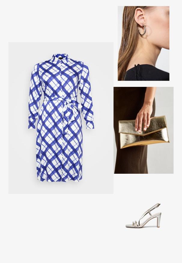 Rochie cu mânecă lungă, cu nasturi, în carouri albastre și albe, cu o curea la talie. Fabricată dintr-un material ușor, cu o textură moale.; Sandalie cu toc înalt, metalice, argintii, cu vârful deschis, având trei bretele subțiri peste picior și o bretea pentru gleznă cu cataramă.; Geantă de mână metalică aurie cu o textură netedă, având un închizător în formă de triunghi. Mâna care o ține are unghii frumos îngrijite.; Cercel din argint cu un finisaj polișat, având detalii mici din aur și o formă rotundă, purtat pe lobul urechii.