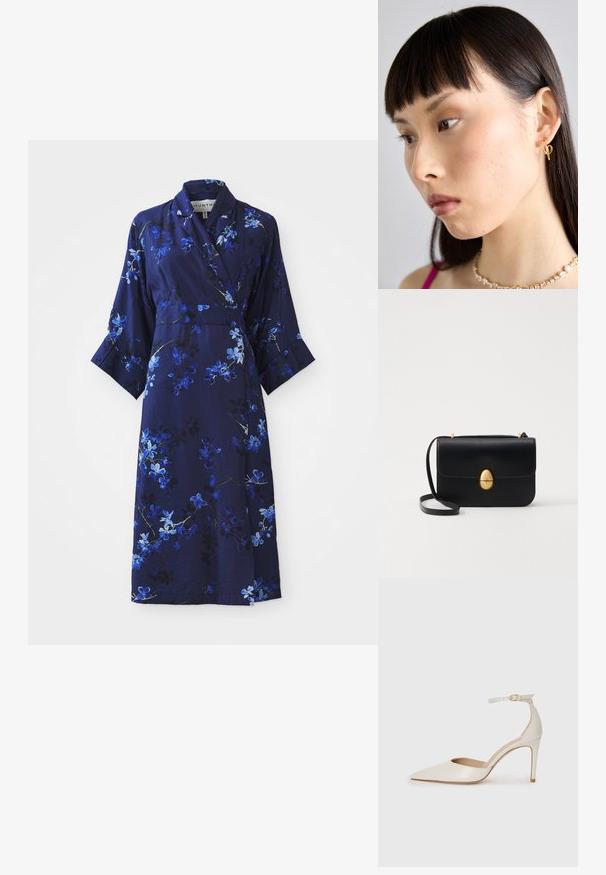 Tengerészi virágos átkötős ruha háromnegyedes ujjakkal, kék és fehér virágmintával, puha anyagból készült, öv részlettel.; Fehér bőr, magassarkú cipő hegyes orral, bokapánttal és vékony tűs sarkal. Simaszövet, finom fényes felülettel.; Fekete bőr kézitáska, struktúrált, téglalap alakú formával. Arany ovális kapoccsal és vékony vállpánttal rendelkezik. Sima textúrájú.; Arany fülbevaló, amelyet a jobb fülön viselnek, nyitott dizájnnal. A modellen egyenes, sötét haj és minimális smink található.