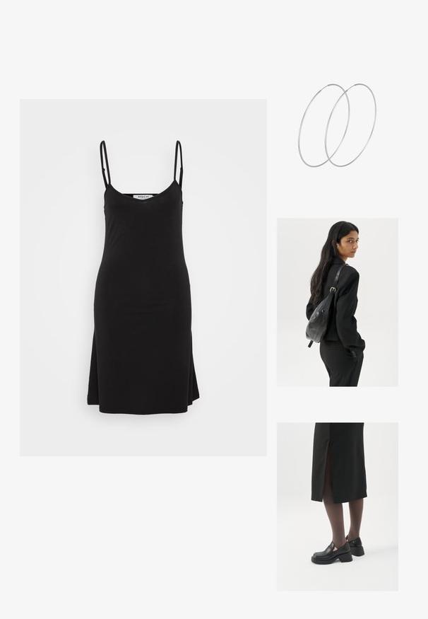 Črna brezrokavna obleka z V-izrezom in tankimi naramnicami. Tkanina je gladka, obleka ima sproščen kroj in rahlo razširjen rob.; Črne usnjene čevlje s zaobljenim prstom, debelim blokastim petama in elastičnimi stranskimi detajli, v kombinaciji s temno nogavicami in črno krilo z razporkom.; Ženska z dolgimi temnimi lasmi, oblečena v črn kostim, nosi črno usnjeno torbo čez ramo in se ozira čez ramo proti beli podlagi.; Srebrne uhane v obliki obroča z minimalističnim dizajnom. Krožna oblika, gladka tekstura in tanek profil. Lahki s poliranim zaključkom.