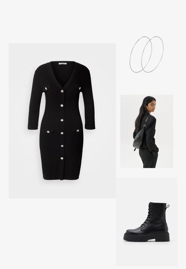 Zwart gebreid jurk met een V-hals, driekwart mouwen, sluiting met knopen aan de voorkant, twee borstzakken en zilverkleurige knopen.; Zwarte leren enkelboots met een ronde neus, vetersluiting aan de voorkant en een dikke rubberen zool met een gestructureerd profiel. Trekbandje aan de achterkant.; Vrouw met lang donker haar in een zwart pak, met een zwart leren schoudertas, die over haar schouder kijkt tegen een witte achtergrond.; Zilveren hoepel oorbellen met een minimalistisch ontwerp. Cirkelvormig, gladde textuur en dun profiel. Lichtgewicht met een gepolijste afwerking.