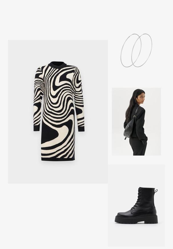 Sort og cremefarvet sweaterkjole med bølgemønster, lange ærmer og ribbet halsudskæring, lavet af strikket stof.; Sorte læder ankelstøvler med rund tå, snørebånd foran og en tyk gummisål med struktureret slidbane. Hæfteløkke bagpå.; Kvinde med langt, mørkt hår iført en sort dragt, bærende en sort læder skuldertaske, som ser over sin skulder mod en hvid baggrund.; Sølvøreringe med et minimalistisk design. Cirkulær form, glat tekstur og tynd profil. Letvægtige med en poleret overflade.