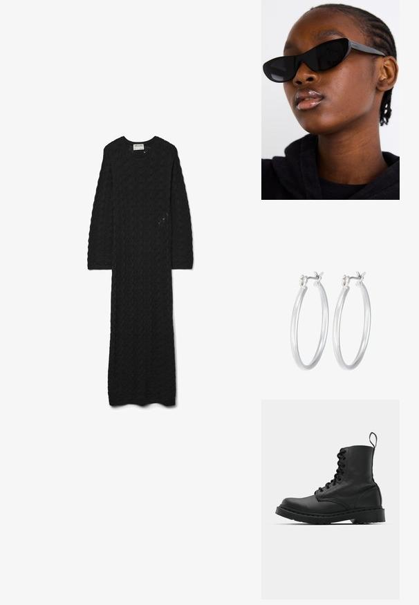 Czarna dzianinowa sukienka z teksturowanym wzorem, z okrągłym dekoltem i długimi rękawami, sięgająca kostek.; Czarne skórzane buty wojskowe z okrągłym noskiem, sznurowanym przodem i pętelką przy kostce. Posiadają grubą gumową podeszwę dla zwiększenia trwałości.; Czarne okulary przeciwsłoneczne w stylu cat-eye z matowym wykończeniem, charakteryzujące się eleganckim designem i delikatnie zaokrąglonymi krawędziami, na tle ciemnego ubrania modelki.; Srebrne kolczyki w formie kółek o gładkim, polerowanym wykończeniu. O okrągłym kształcie i pewnym zapięciu na klik. Lekka konstrukcja odpowiednia do codziennego noszenia.