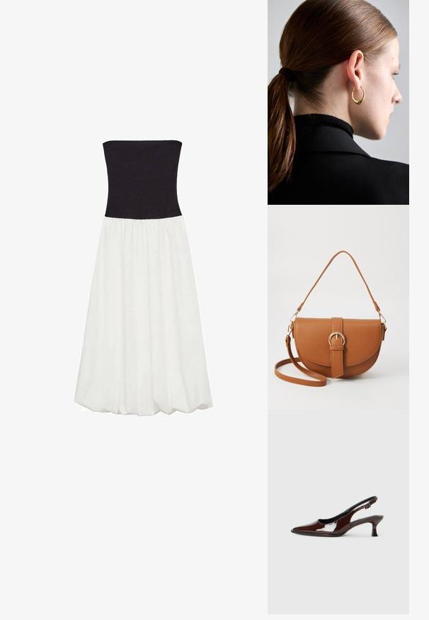 Sukienka bez ramiączek z czarną górą i zwiewnym białym dołem. Tkanina jest gładka, z marszczonym szwem w talii, tworząc kontrastujący blok kolorów.; Brązowe lakierowane skórzane buty na obcasie typu slingback z ostrym noskiem i umiarkowanym obcasem. Posiadają pasek z klamrą dla zapewnienia stabilnego dopasowania. Gładka tekstura.; Brązowa skórzana torba na ramię o zaokrąglonym kształcie, ze złotymi akcentami i zapięciem w formie klamry. Posiada odpinany pasek na ramię.; Złoty kolczyk w kształcie obręczy o zaokrąglonym, lekko teksturowanym wzorze, noszony w lewym uchu na tle ciemnych włosów i czarnej odzieży.