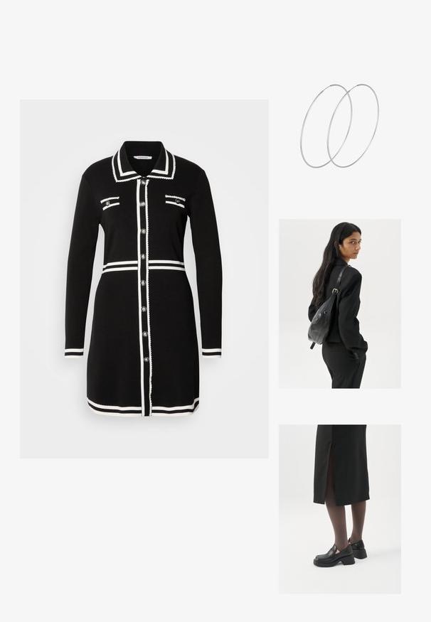 Abito nero con scollatura a colletto, bordo bianco, due tasche sul petto e bottoni argentati. Realizzato in tessuto a maglia, design a maniche lunghe.; Scarpe in pelle nera con punta arrotondata, tacco spesso a blocco e accenti laterali in elastico, abbinate a collant scuri e una gonna nera con uno spacco.; Donna con lunghi capelli scuri, vestita con un completo nero, che porta una borsa a tracolla in pelle nera, mentre guarda oltre la spalla su uno sfondo bianco.; Orecchini a cerchio in argento con un design minimalista. Forma circolare, superficie liscia e profilo sottile. Leggeri con una finitura lucida.