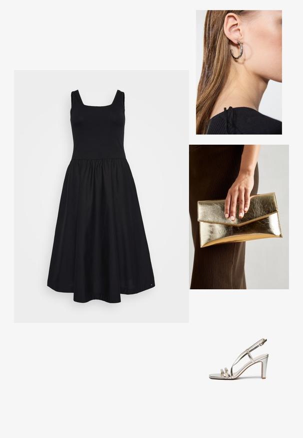 Black dress with a fitted ribbed bodice and a flared skirt. Features a square neckline, wide shoulder straps, and a smooth fabric texture.; Metallic silver high-heel sandal with an open toe, featuring three thin straps across the foot and an ankle strap with a buckle.; Gold metallic clutch bag with a smooth texture, featuring a triangular flap closure. The hand holding it has neatly manicured nails.; Silver hoop earring with a polished finish, featuring small gold accent details and a round shape, worn on the lobe.